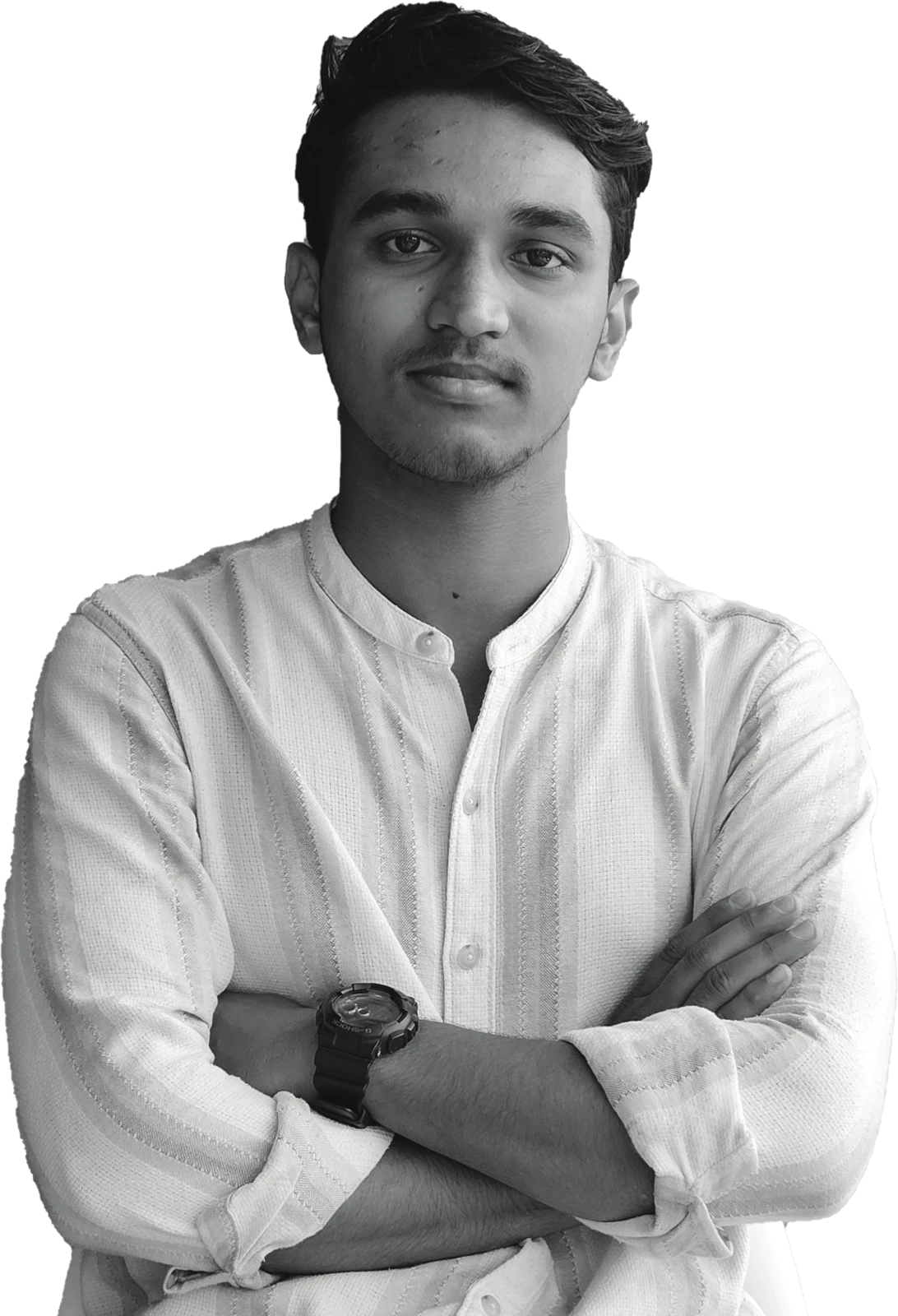 Muhammad Sahal, arms folded, in a white shirt