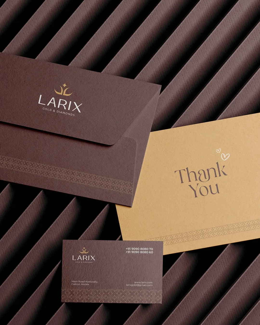 Larix stationery suite of envelopes, thank-you card and business cards in plum and gold