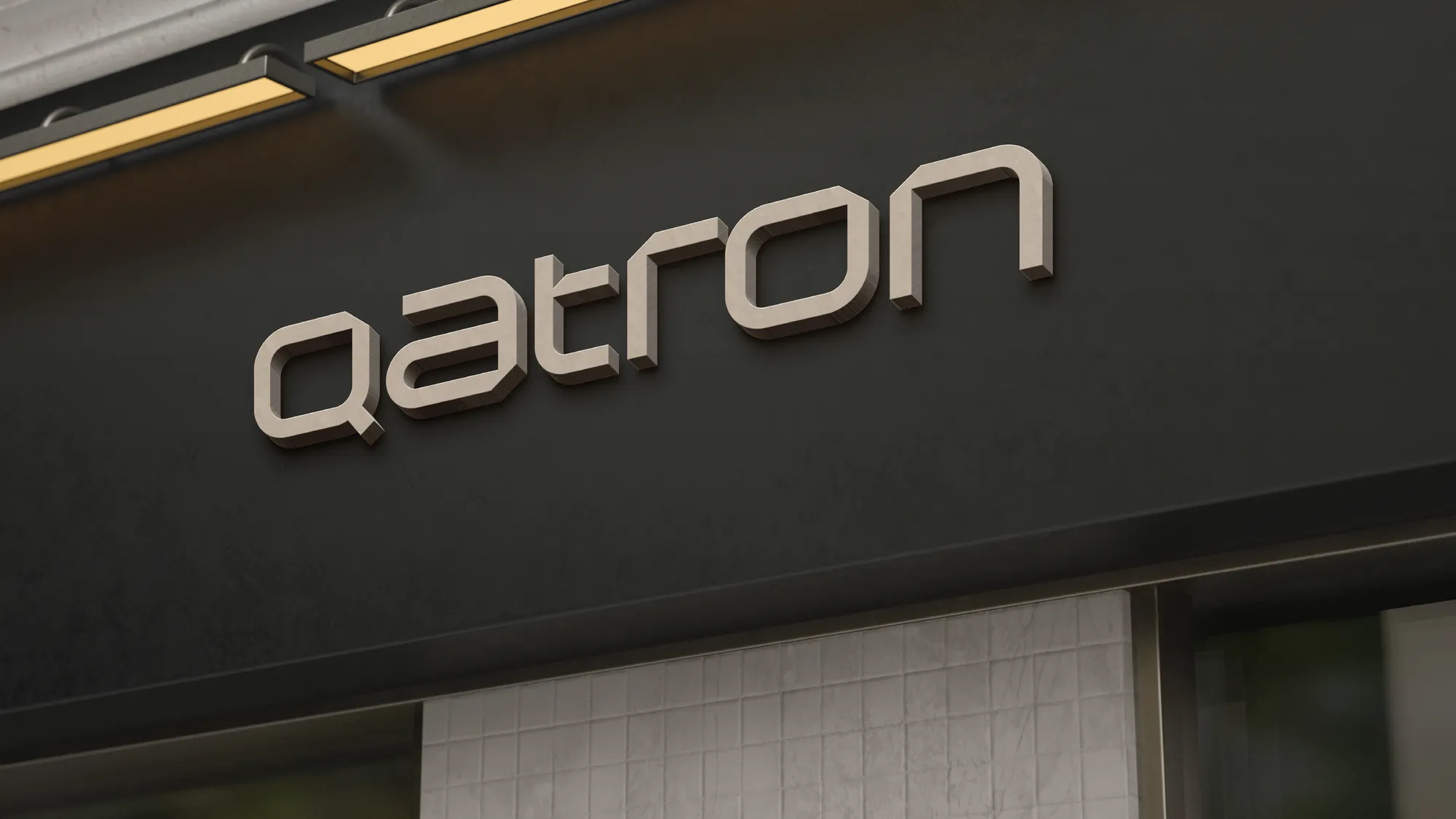 Brushed metal Qatron storefront sign