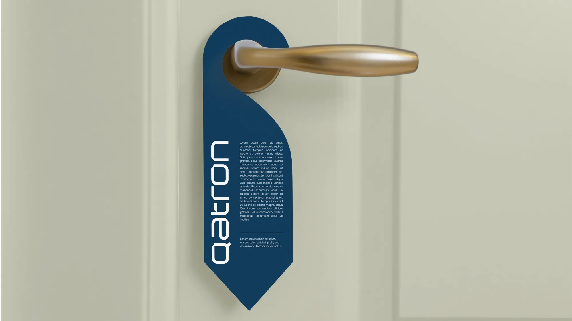 Navy Qatron door hanger on a brass handle